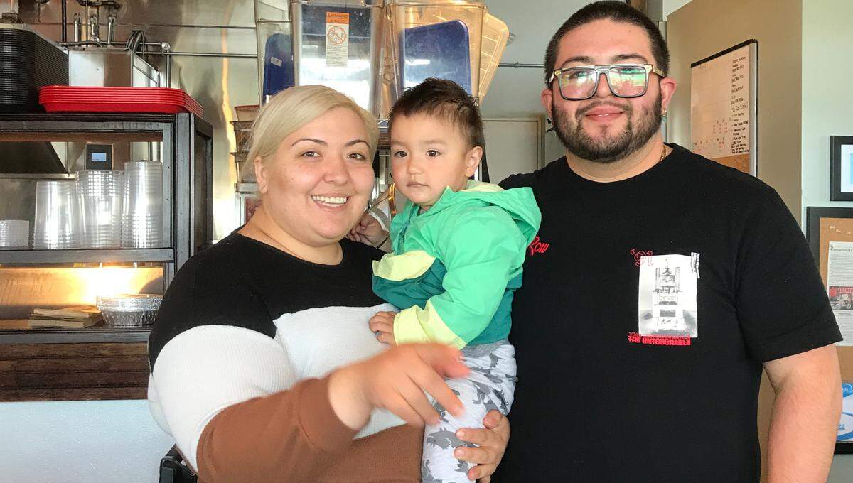 Nadine Iniquez and Luis Cortez, the married couple behind new Morro Bay restaurant Rock Tacos, pose for a picture with their 19-month-old son, Jose Emiliano.