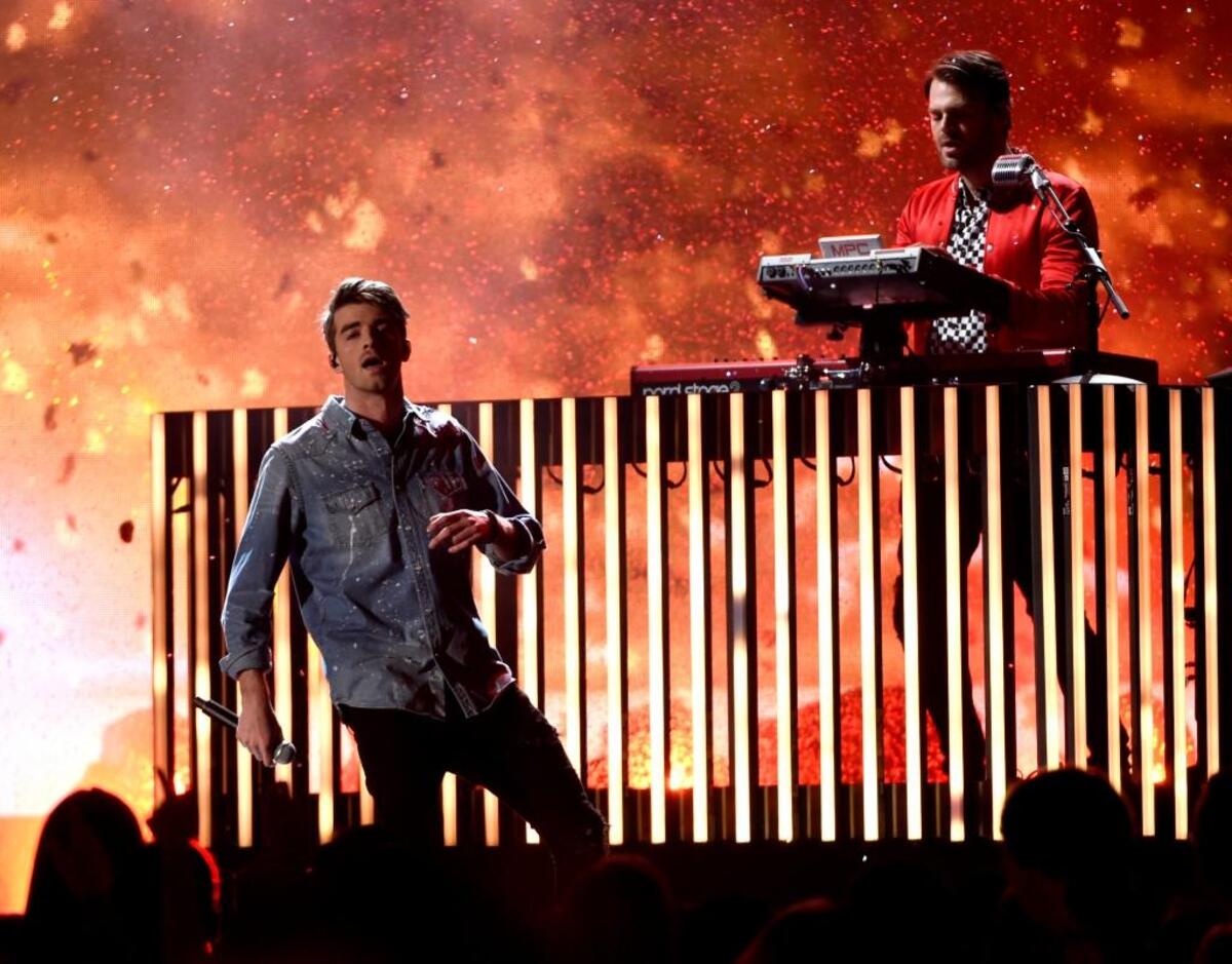 Andrew Taggart, left, and Alex Pall, right of The Chainsmokers perform “Young” at the Billboard Music Awards at the T-Mobile Arena in Las Vegars in May. The Chainsmokers play Friday at the California Mid-State Fair in Paso Robles.