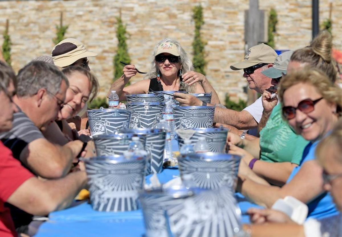 The 71st annual Pismo Beach Clam Festival was held next to Pismo Pier on Friday, Saturday and Sunday. Seated at the end of a long table of clambake buckets is Louis Knabe of Santa Rosa. The buckets held little neck clams, sausage, heirloom potatoes, sweet corn and other local produce.