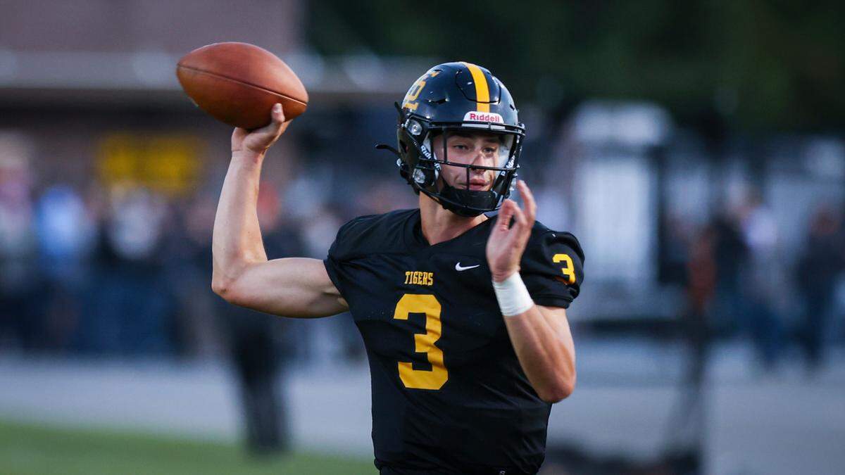 Jace Gomes threw for touchdowns and ran for important yards. San Luis Obispo High School won 34-23 over Mount Whitney, of Visalia Aug. 23, 2024.