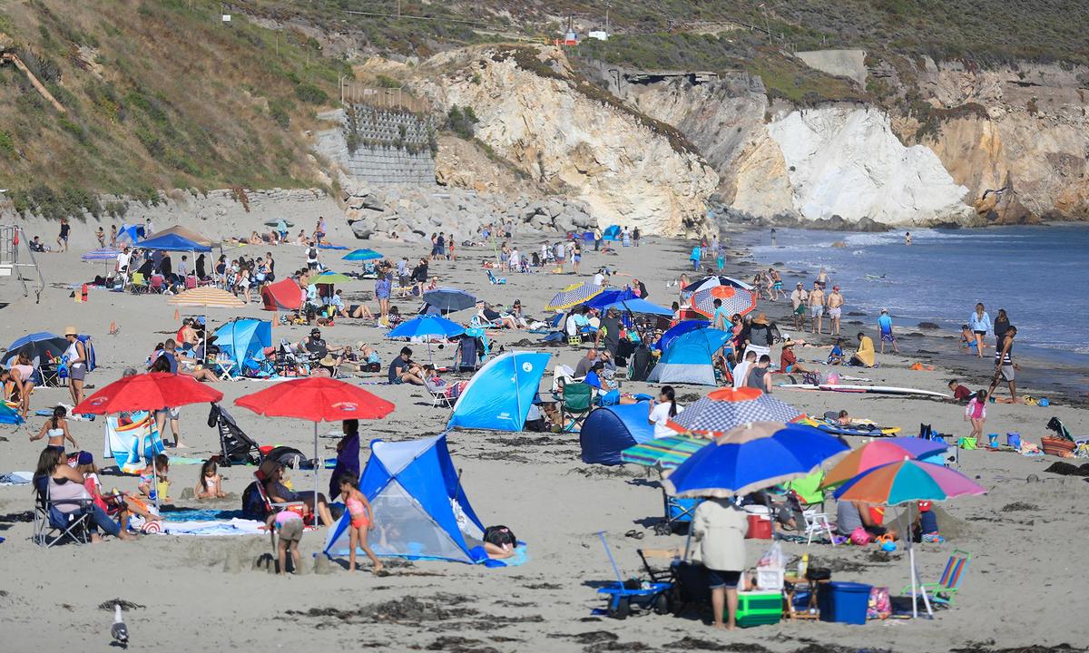 The east side of Avila Pier in Avila Beach is packed with people on Saturday, July 13, 2019.