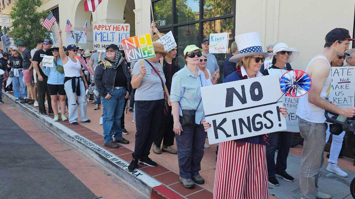 Protesters gathered in front of the courthouse in San Luis Obispo on No Kings Day to protest executive overreach by the Trump administration.