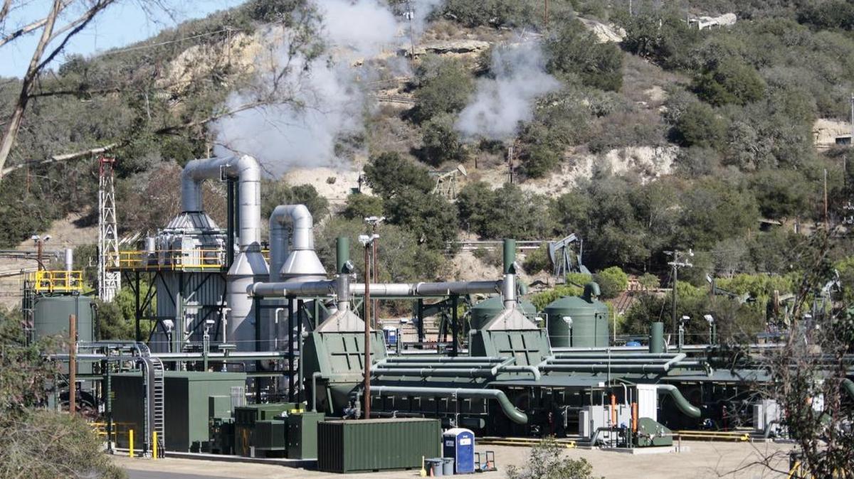 The oil field and production machinery in Price Canyon as seen from Price Canyon Road.
