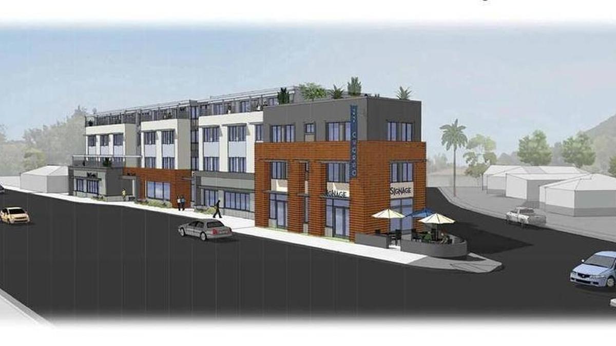 A rendering shows a housing and commercial project planned for 22 Chorro St. in San Luis Obispo.