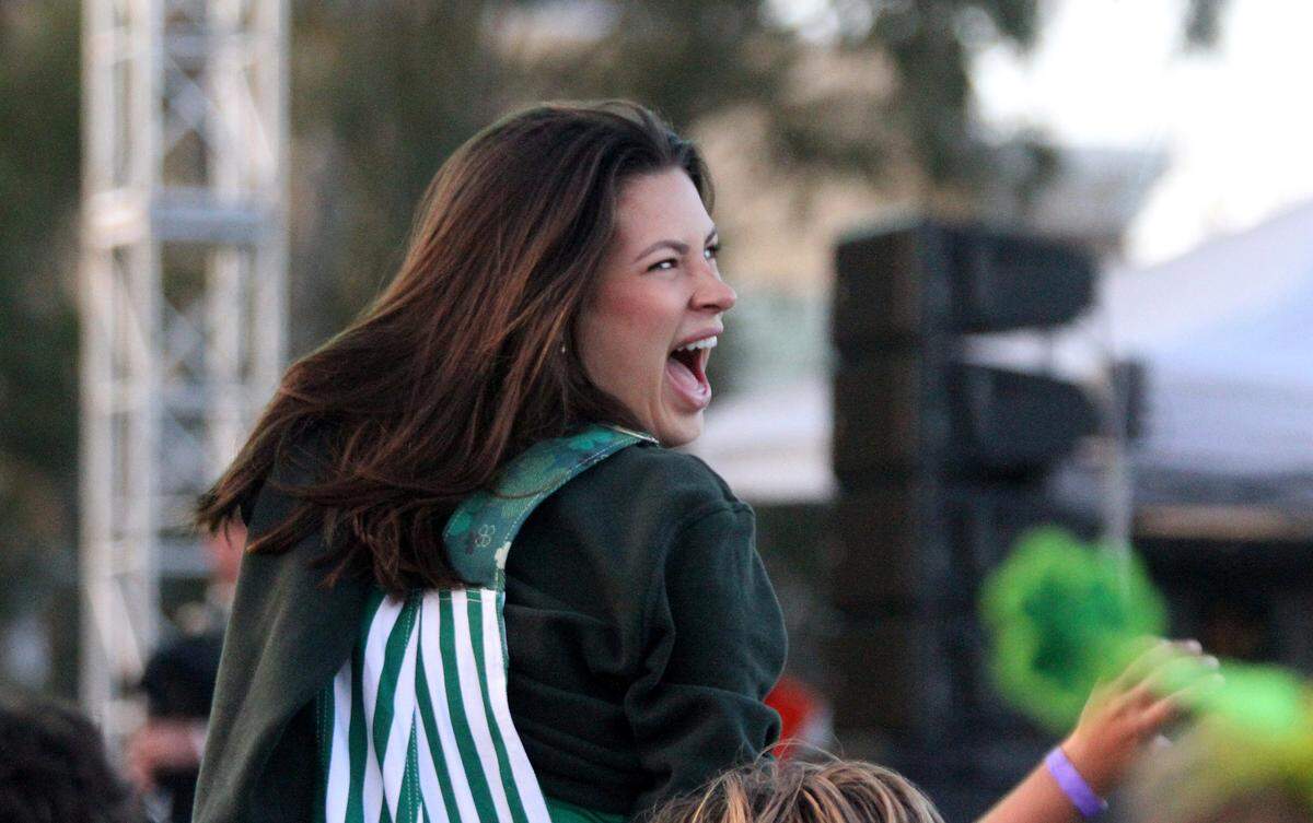 A concert-goer decked yells along with the crowd as Galantis performs at Cal Poly’s “Morning on the Green” music festival on March 15, 2025. The event was an alternative to the St. Fratty’s Day street party.