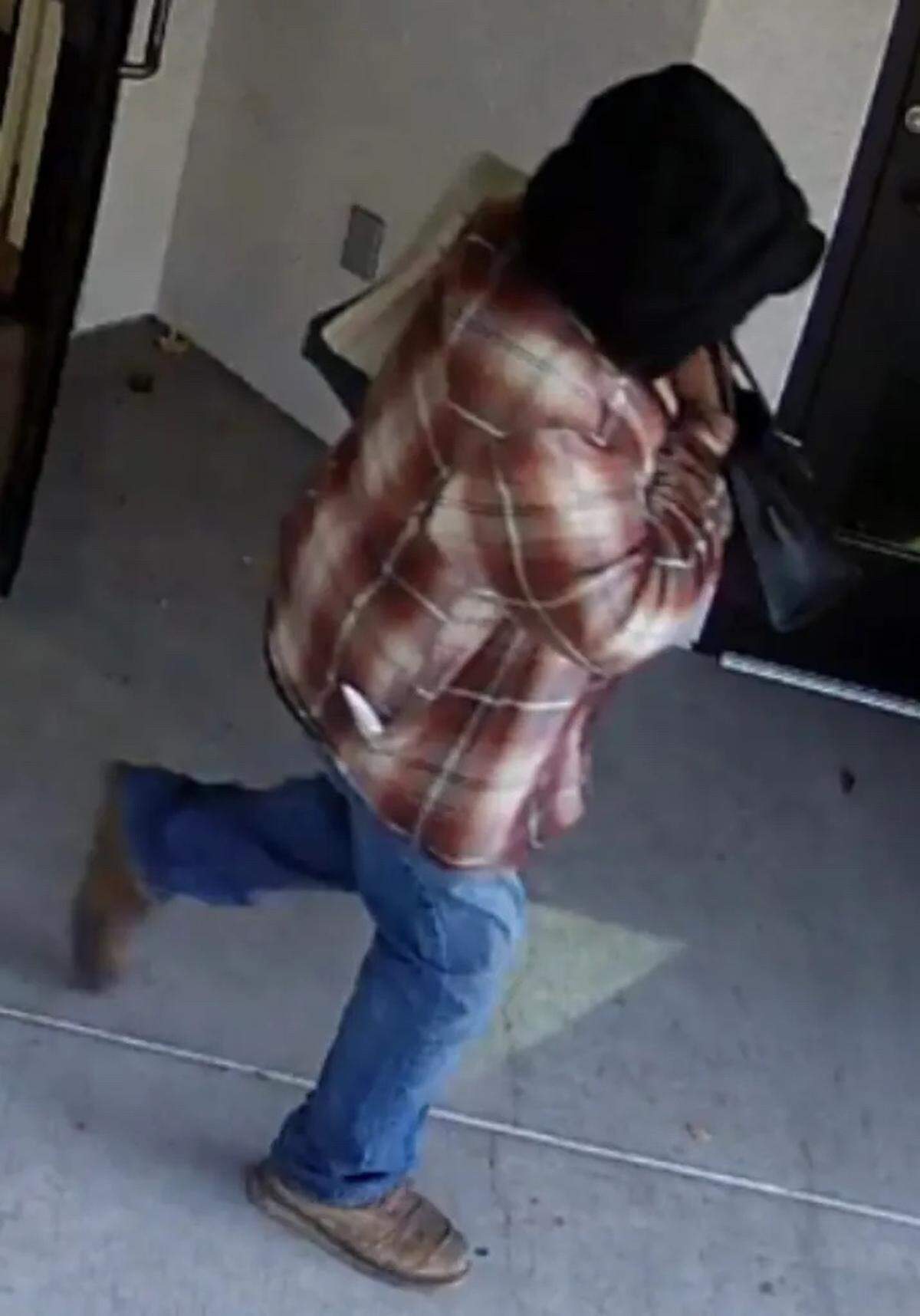 A Santa Maria bank robbery suspect leaves the scene of the crime on Monday morning, Nov. 27, 2023.