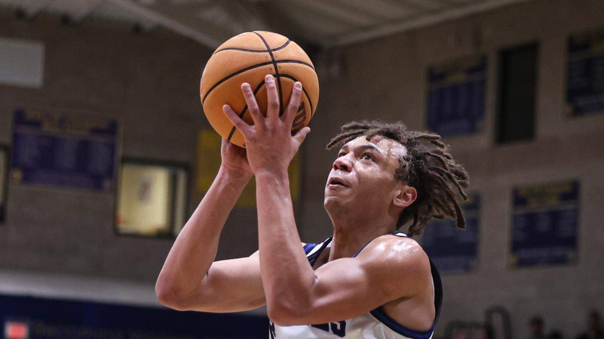 Jayden Nozil takes a pass to the basket. Mission Prep beat Frontier 67-55 to advance to the Division II Central Section final seen here on Feb. 21, 2025.