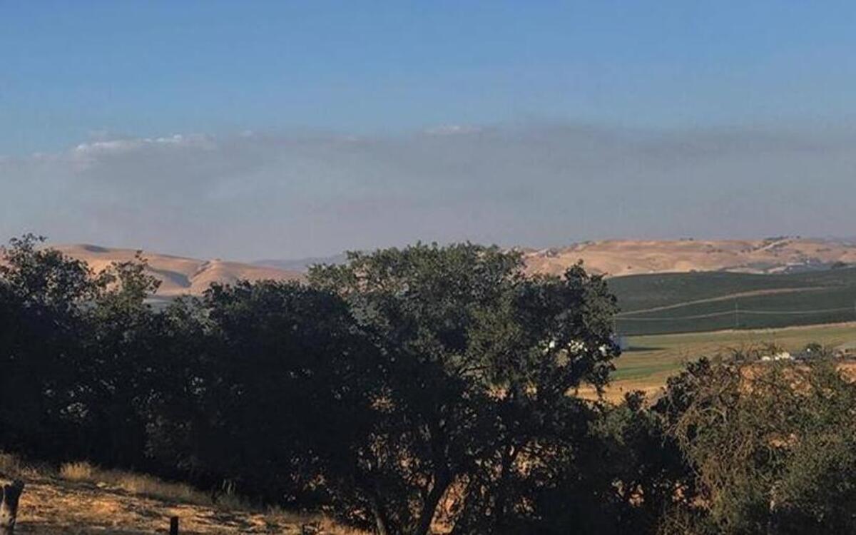Smoke from the Country Fire in Monterey County, near Bradley, as seen from San Miguel on Monday, Aug. 7, 2017.