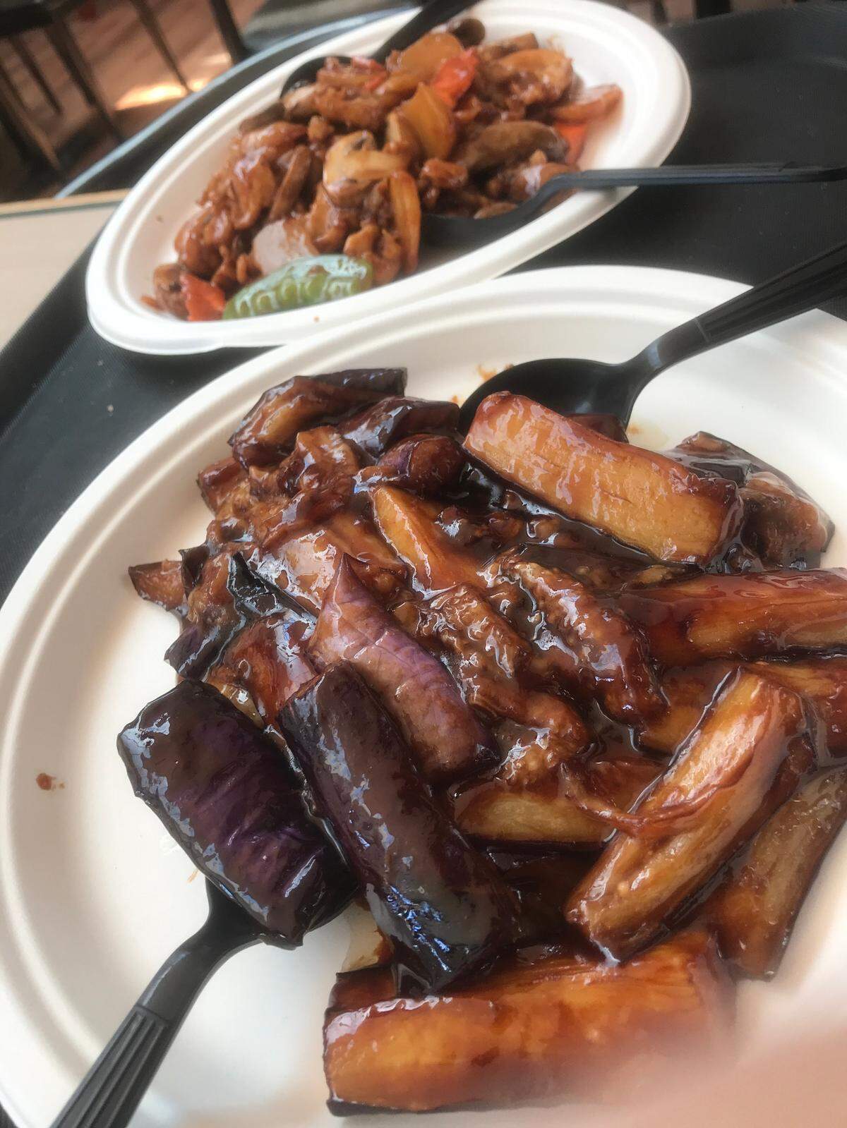 The menu at the new Panda Panda Chinese Restaurant in Morro Bay has nearly 90 diverse items on it, including the eggplant in brown sauce (in front) and a mushroom chicken dish.