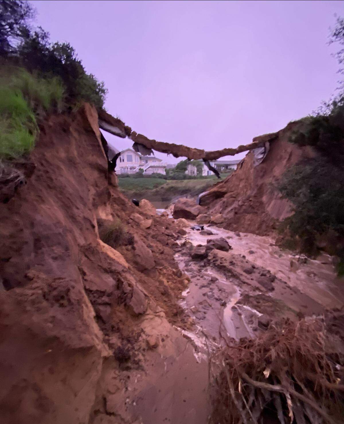 A water retention basin in Los Osos failed on Monday, Jan. 9, 2023, sending floodwaters pouring into the neighborhood below and damaging 20 homes in the vicinity of Vista Court and Montana Road.