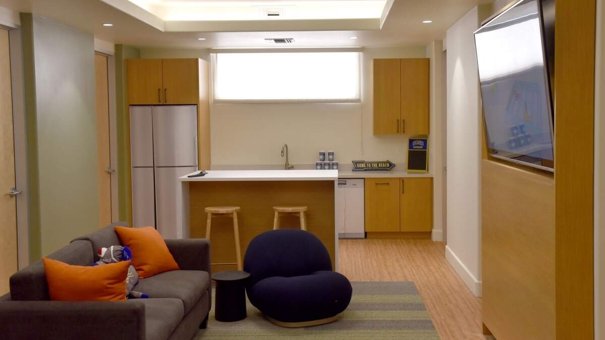 A mock-up of the suite common area in the proposed Munger Hall at UCSB. University officials say approval of the giant dormitory could come as early as summer 2023, with construction completed by 2026.