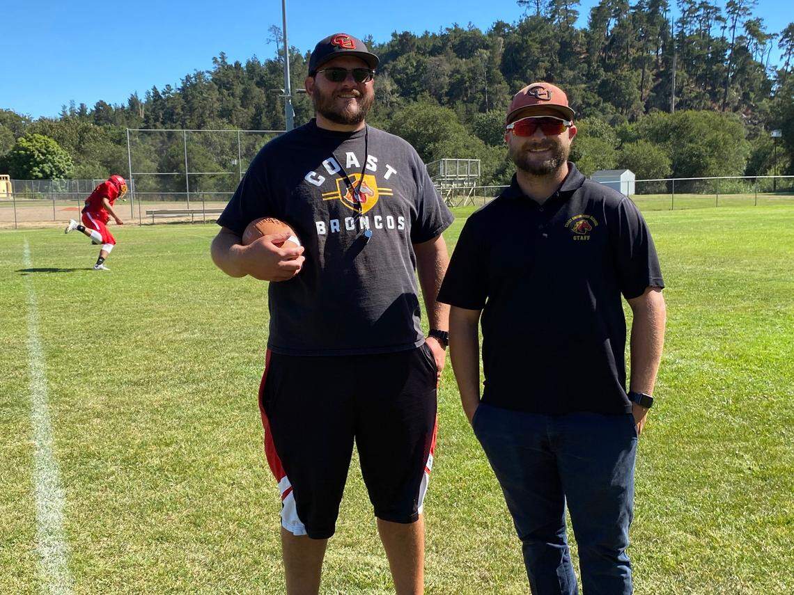 Head Coach Andrew Crosby, left, is “upset” that Valley Christian Academy is forfeiting its game with Coast Union because the Broncos have two girls on the team. With him is Assistant Coach Trevor Neer.