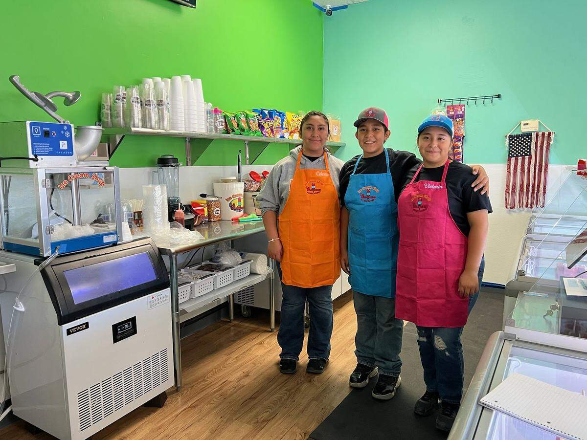 From left: Celeste, Tony and Victoria Medina help their parents out after school and on weekends at Ice Cream Shop La Michoacana