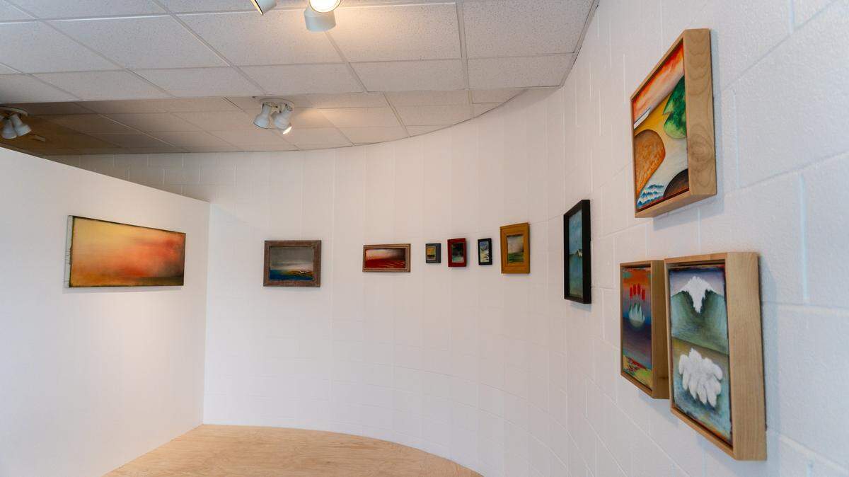 The modern, minimalist decor at Cambria’s new Cruise Control Gallery is designed to create a sense of calm and focus on the art, not the surroundings. A small, raised, wood stage is flanked by works by Venice artist Ned Evans.