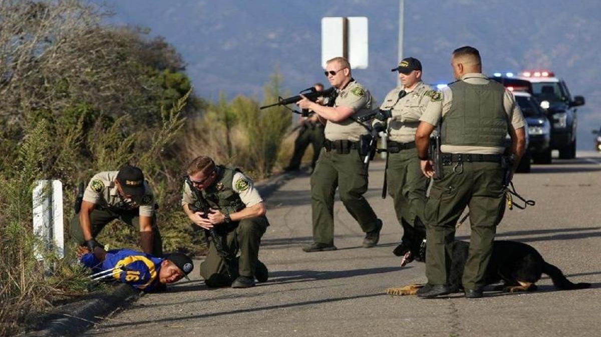 Santa Barbara County sheriff’s deputies, with the assistance of a K-9 team, take a suspect into custody along Highway 217 near Goleta Beach Park late Saturday afternoon. A male victim was stabbed multiple times at the park, and witnesses reported seeing at least three suspects running from the scene.