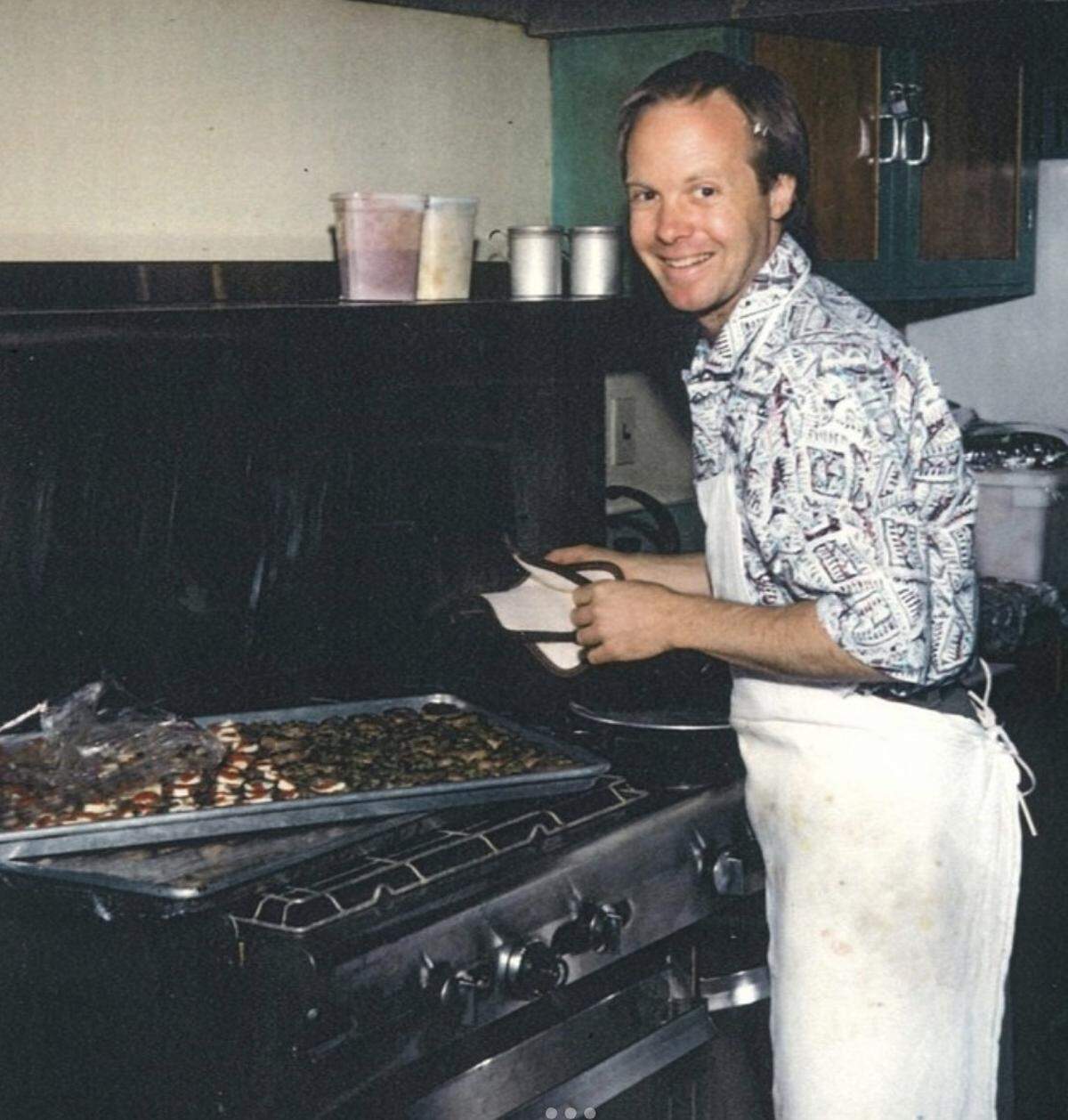 In the early days of the Covey restaurant empire in San Luis Obispo County, Chef Robin Covey tends ingredients on a sheet pan, preparing for service. Current destination restaurants in the empire, as of May 2025, include Robin’s in Cambria, Nova and Luna Red in San Luis Obispo.