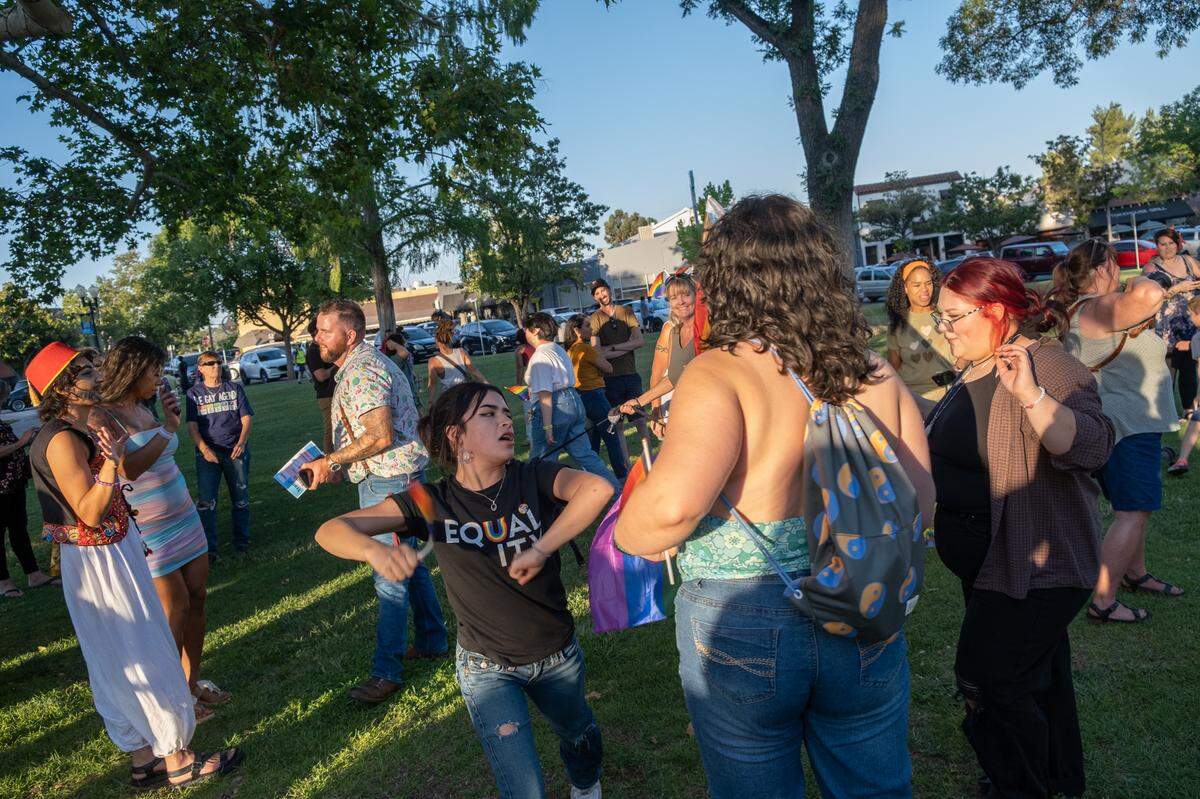 People have a dance party during Paso Pride in downtown Paso Robles on June 24, 2022.