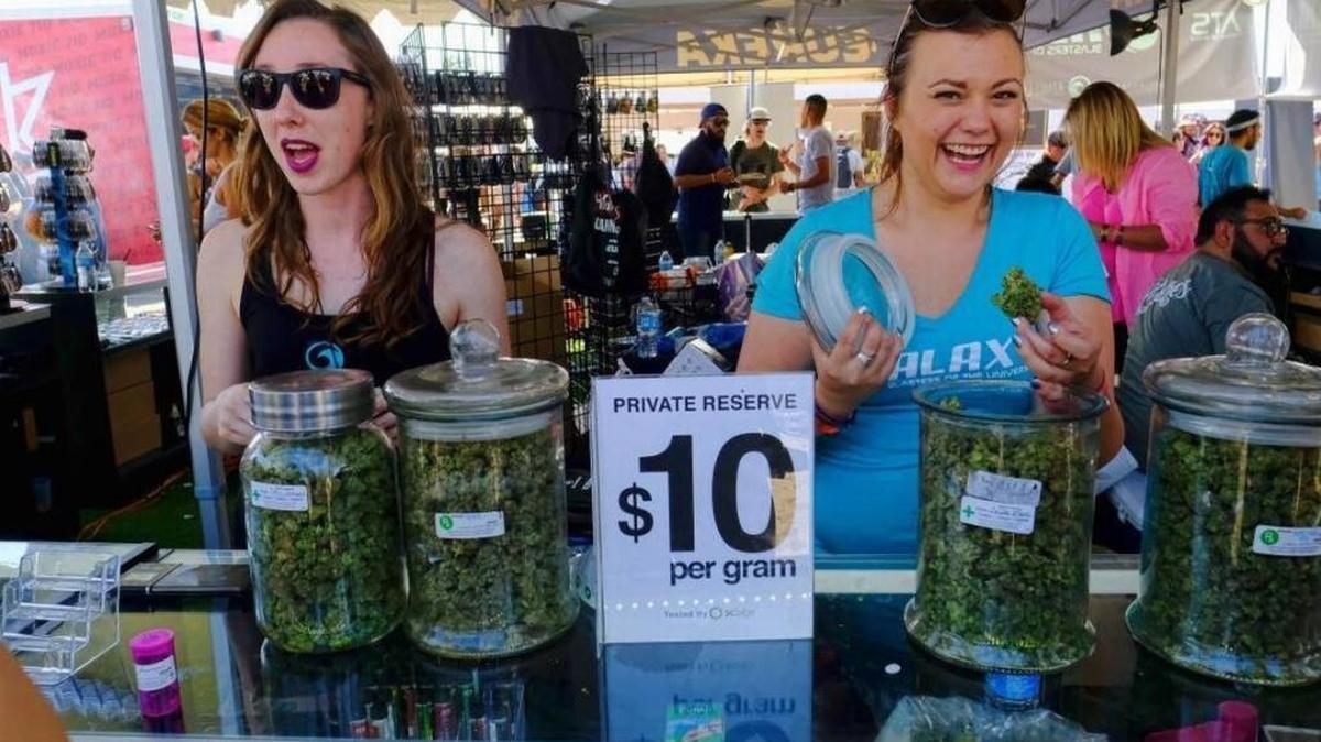 In this April 23, 2017, file photo, vendors offer marijuana for sale at the High Times Cannabis Cup in San Bernardino.
