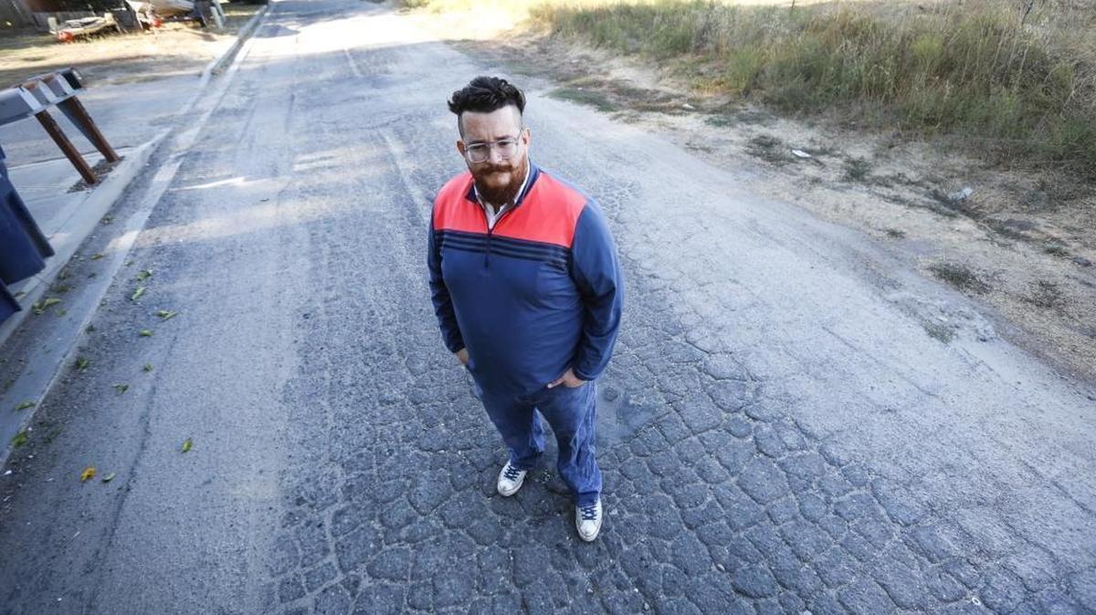 Bill Mavety stands in the middle of Amapoa Avenue, a road riddled with alligator cracks, potholes and bumps. The street is in Atascadero, but the city declined to include it in its sytem of maintained roads.