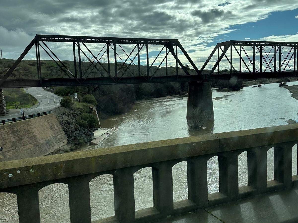 Water flows in the Salinas River under the East Garrison Bridge in Bradley in February 2024.