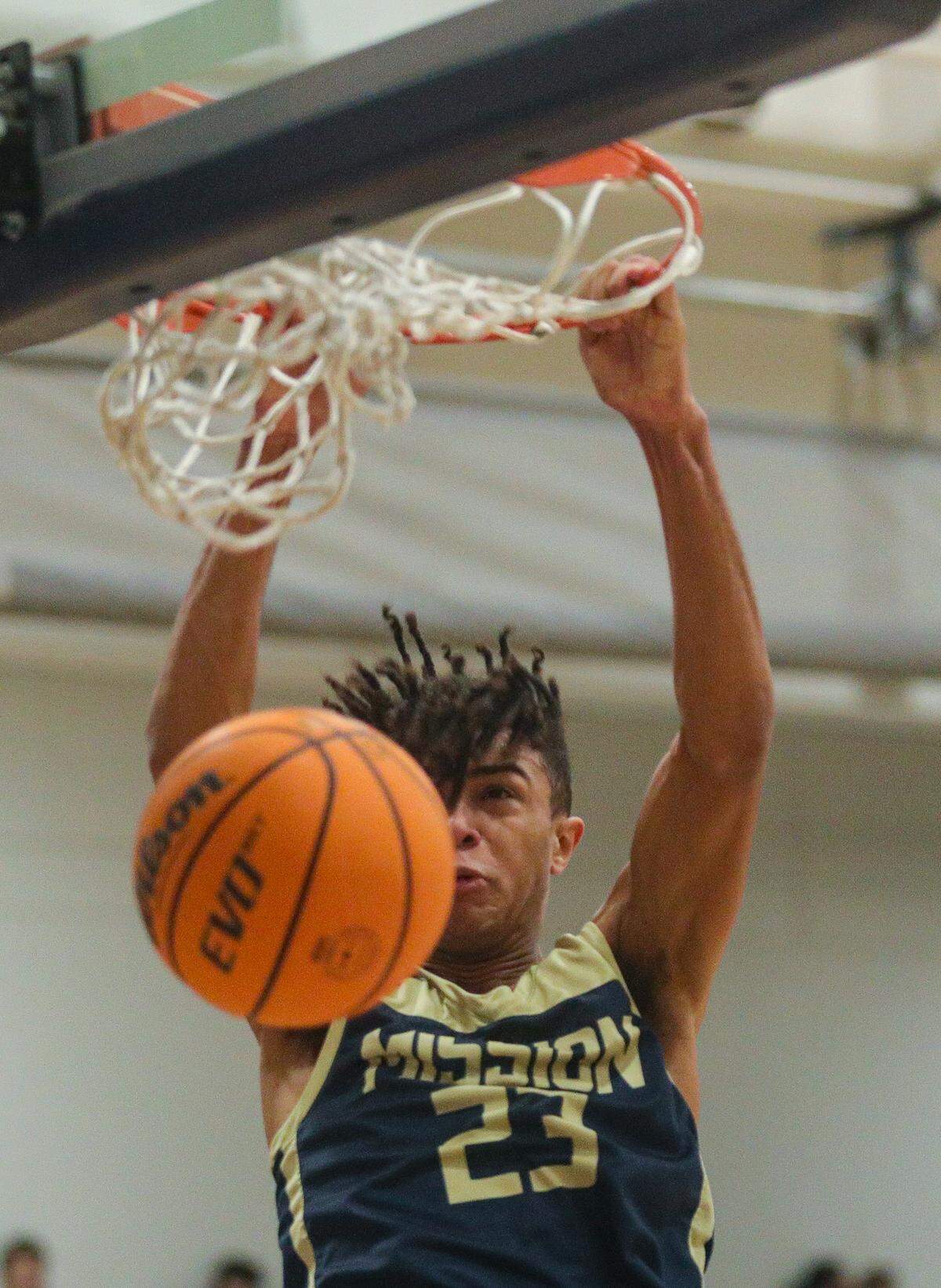 Jamar Howard dunks for Mission Prep. The Royals beat the Arroyo Grande Eagles 64-28 in a boy’s basketball game on Feb. 10, 2023.
