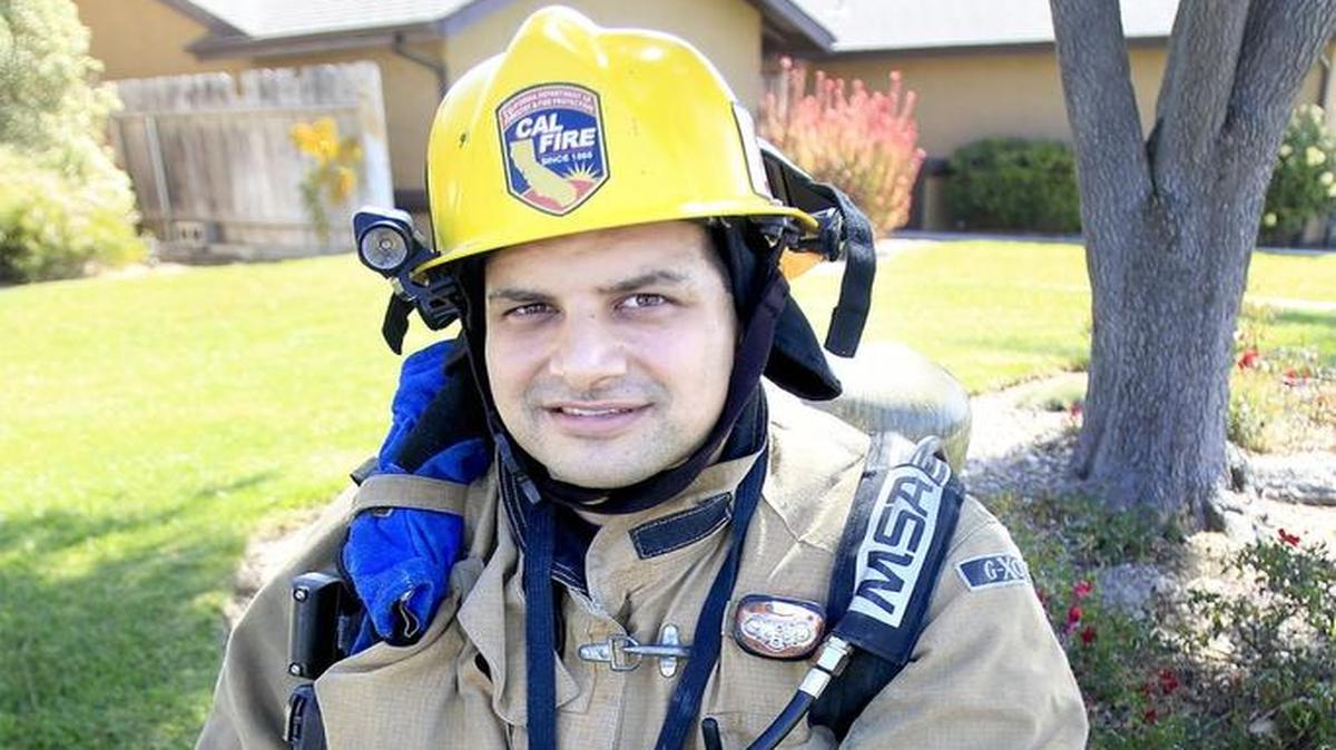 Nipomo volunteer firefighter Anthony DiBernardo is training for a 9/11 Memorial Stair Climb in Nashville. He trains at the Cal Poly gym in full firefighter gear.