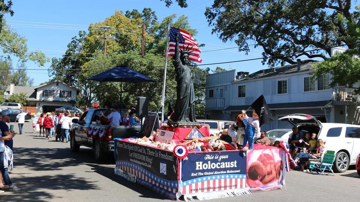 Members of the Abolition Society of San Luis Obispo present their float at Templeton’s annual Fourth of July parade.