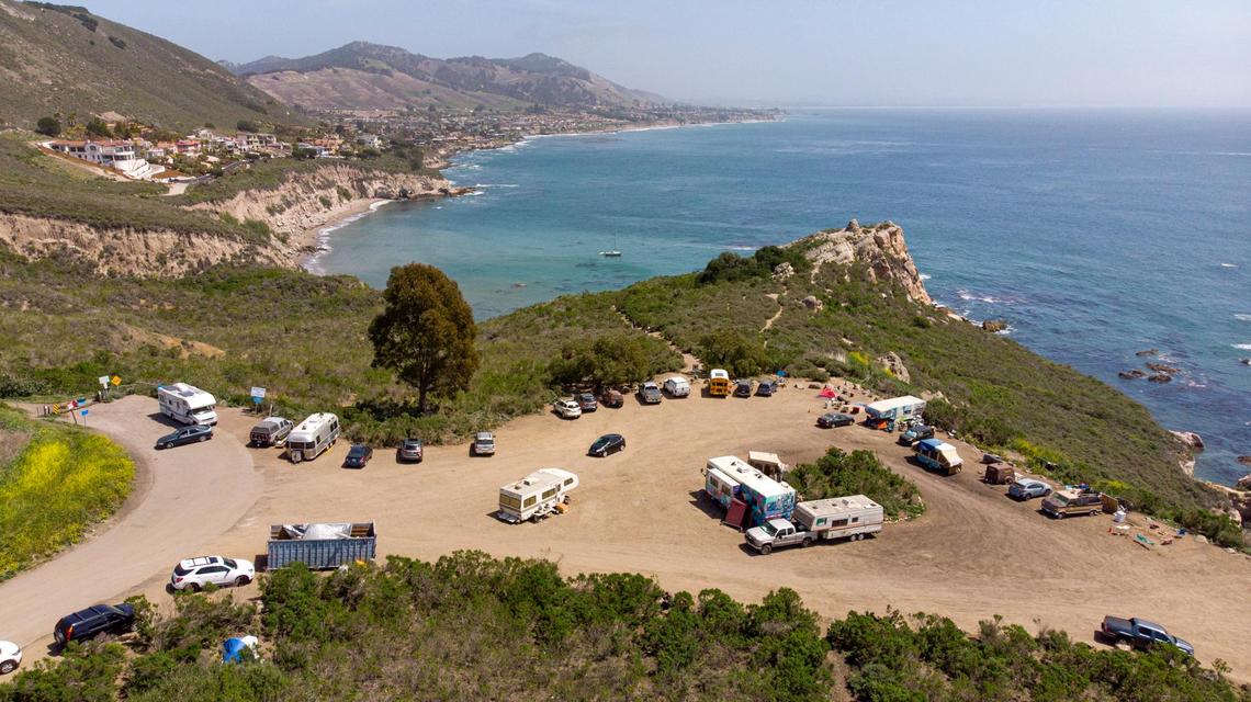The Cave Landing parking area, next to Pirate’s Cove in background, has become an informal campground. San Luis Obispo County has plans to hire a ranger, improve the parking lot and remove graffiti and camping.