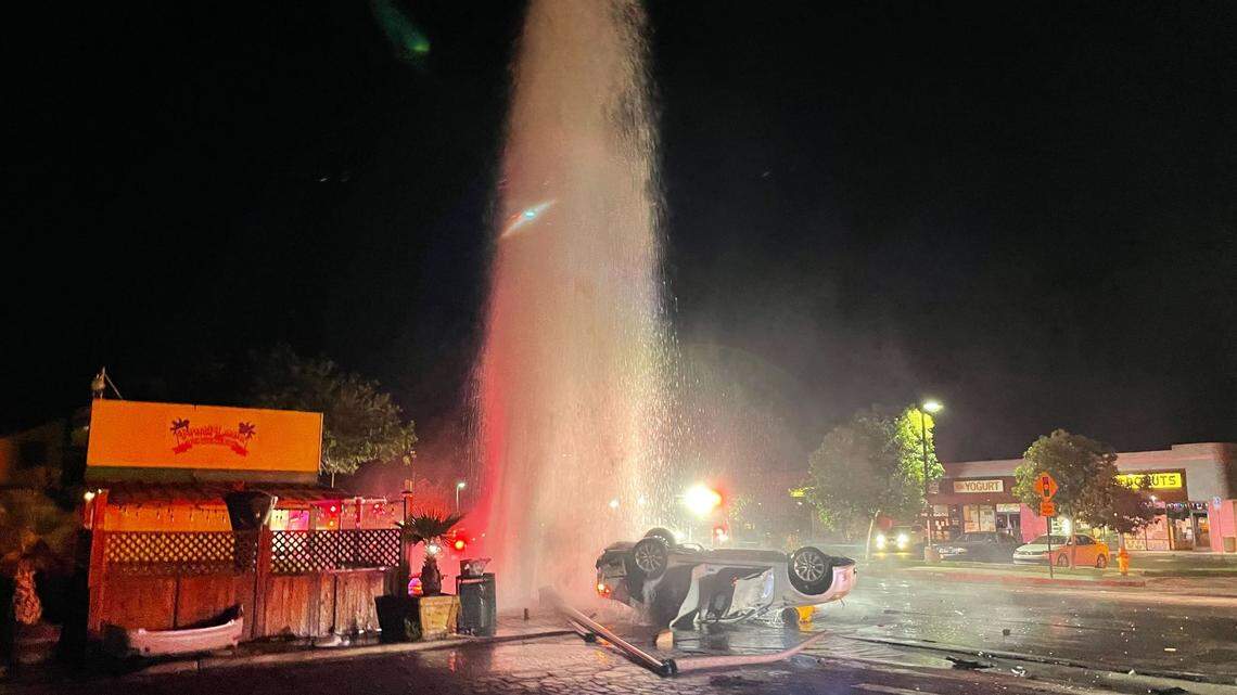 A vehicle crashed into a fire hydrant and overturned in front of the FrutiLand restaurant in Arroyo Grande on Aug. 7, 2022.