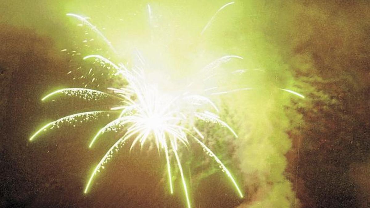 Fireworks explode over barges at Tidelands park in Morro Bay on July 4, 2001.