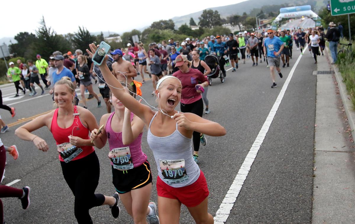 Runners take off at the start of the SLO Half Marathon on Madonna Road in San Luis Obispo on Sunday, April 28, 2019.