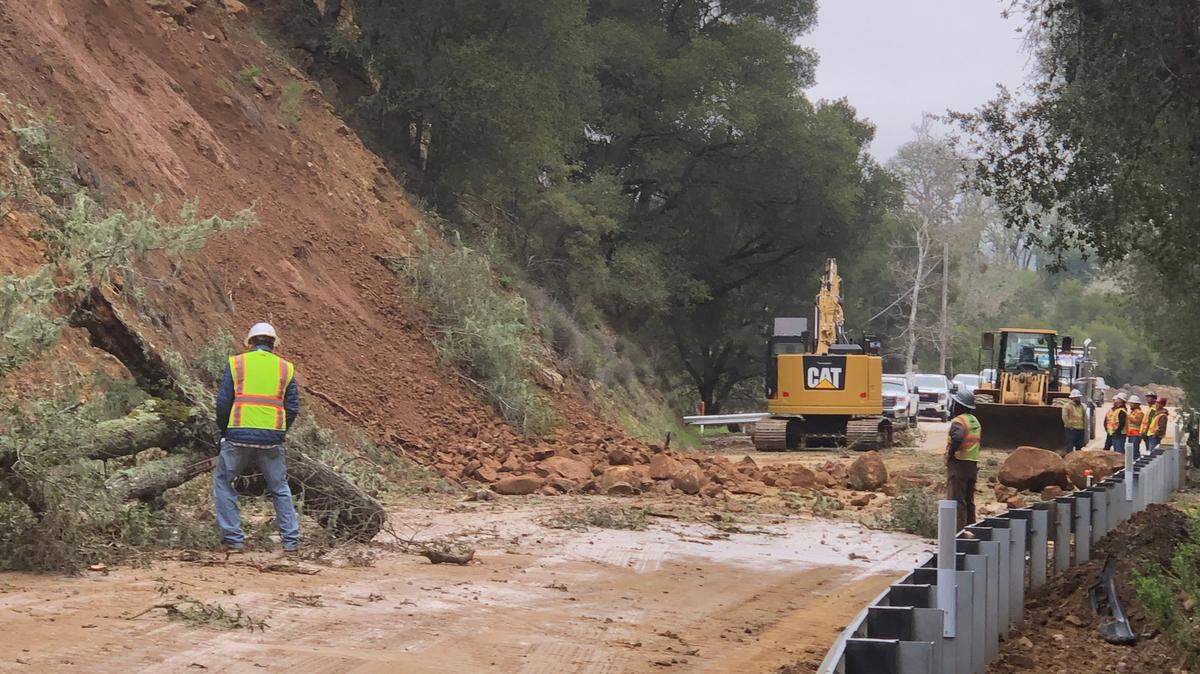Crews work to repair slides on Highway 41 west of Atascadero on March 17, 2023.