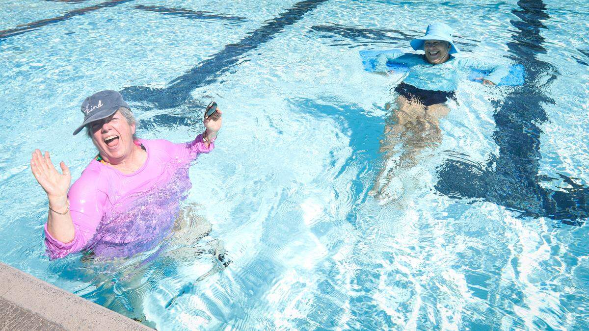 Joni Gold, left, and Linda Gardner exercise and cool off at the San Luis Obispo Swim Center’s Sinsheimer Pool on Oct. 3, 2024.