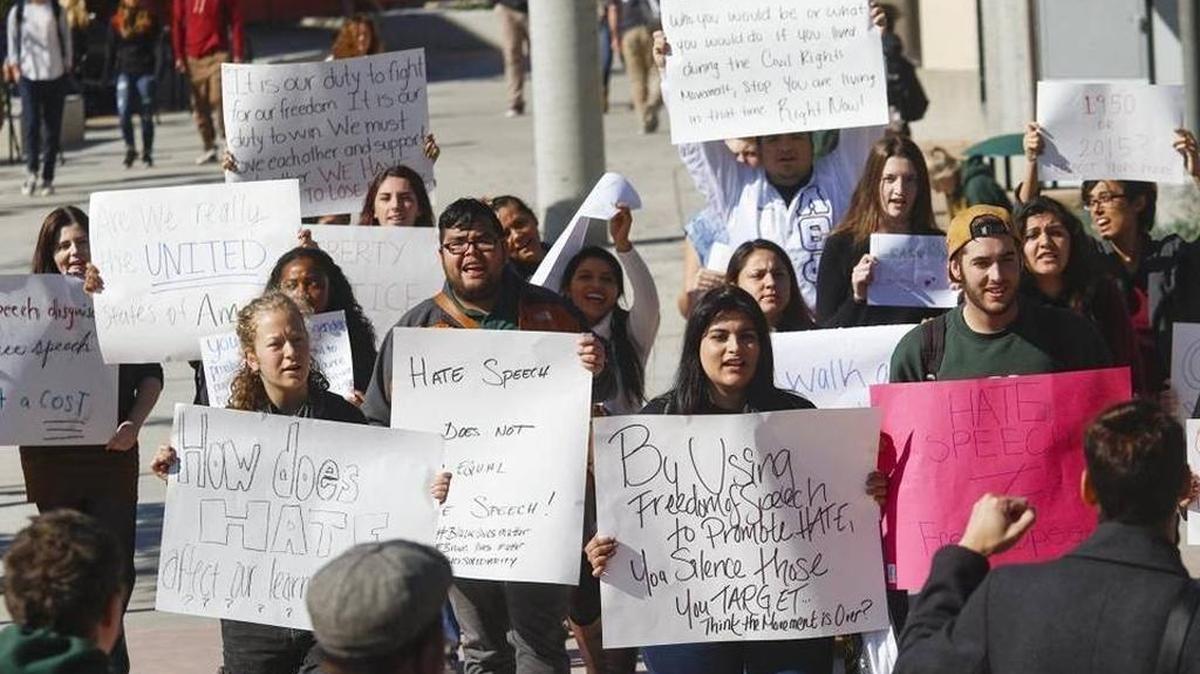 Cal Poly students protest the appearance of hate speech on a “Free Speech Wall” erected on the Dexter Lawn in November.