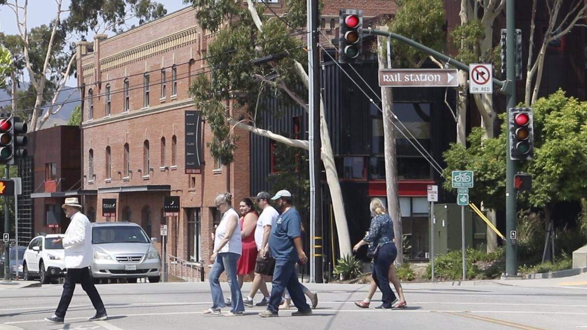 James Papp, an architectural historian, leads participants on a walking tour of San Luis Obispo’s railroad district organized by Secret SLO.