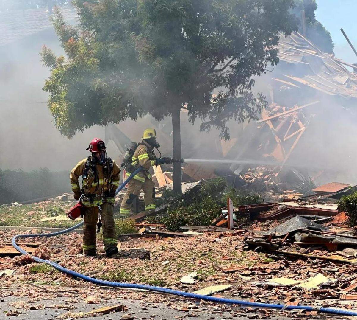 Debris and smoke in the aftermath of an explosion and fire in Santa Maria Wednesday.