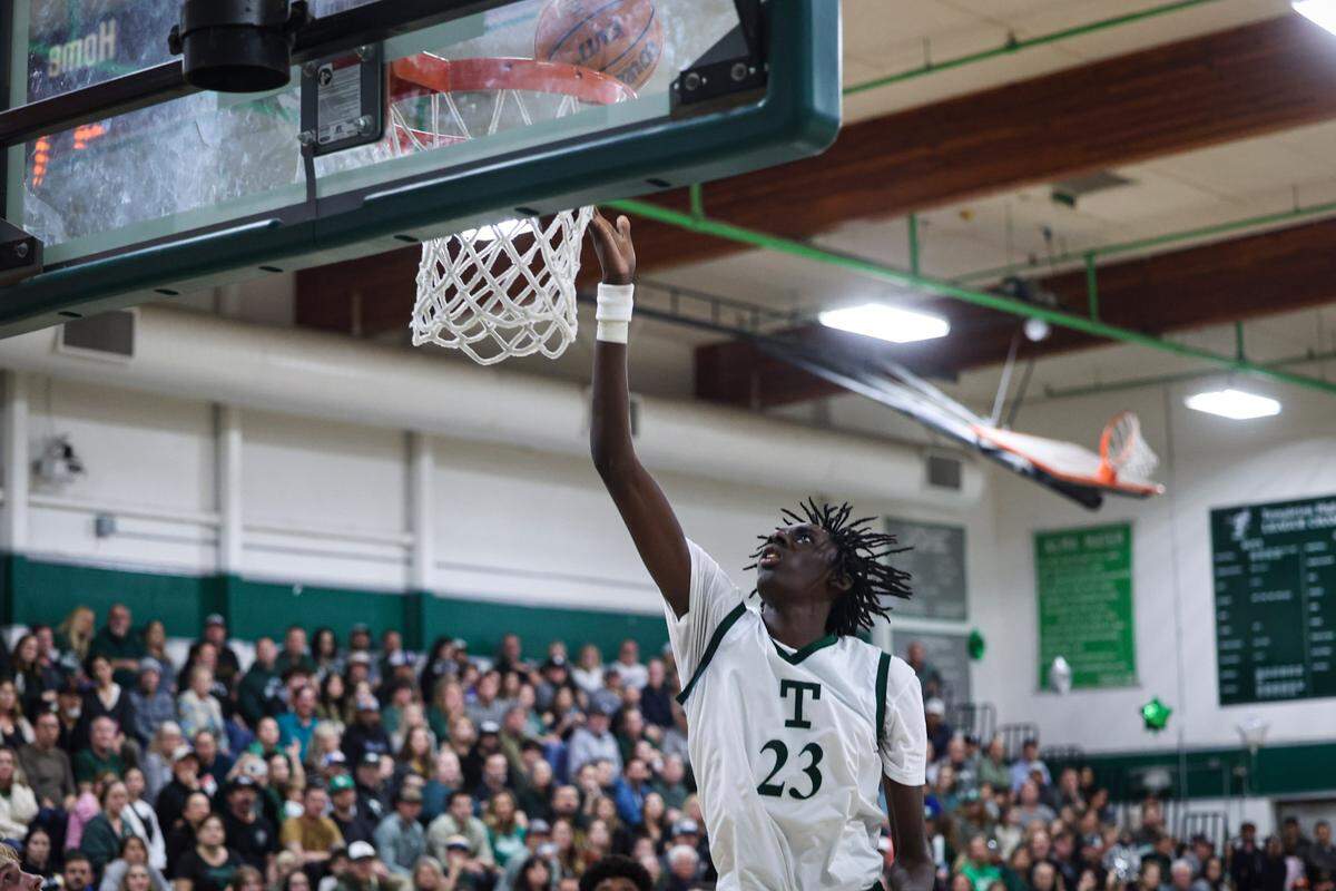 In a close game, Templeton High School pulled away in the final minutes winning 62-53 over the Atascadero boy’s basketball team Feb. 7, 2024. Trevon Carter-Givens is The Tribune’s 2023-24 San Luis Obispo County player of the year.