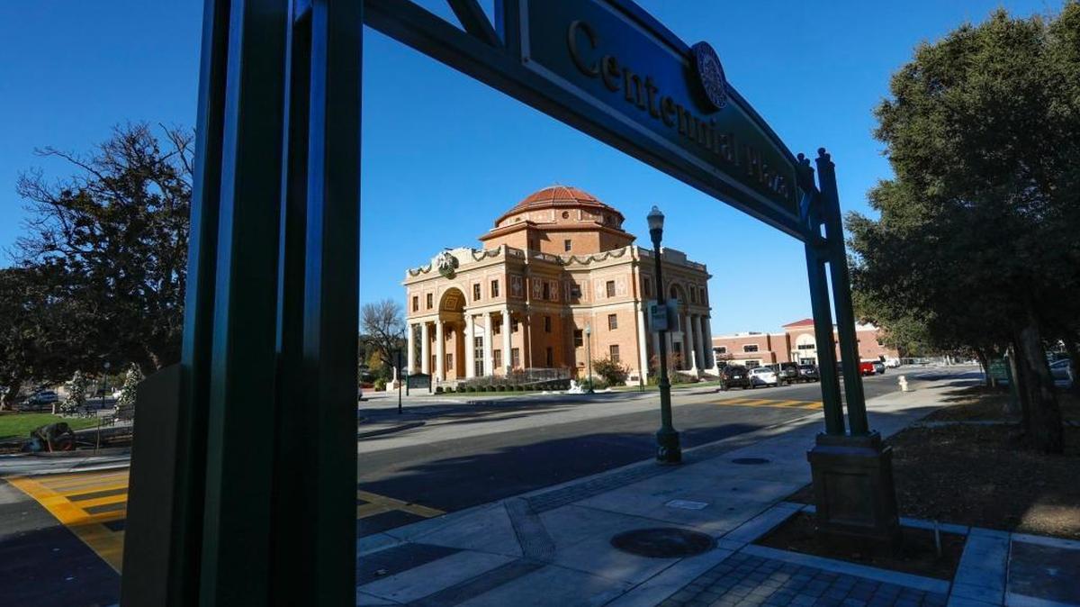 The entry to Centennial Plaza frames Atascadero City Hall in background.