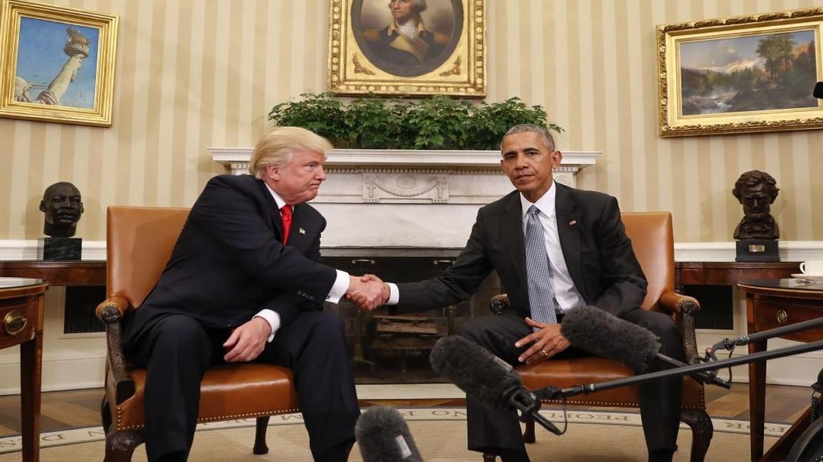President Barack Obama and President-elect Donald Trump shake hands following their meeting in the Oval Office of the White House in Washington.