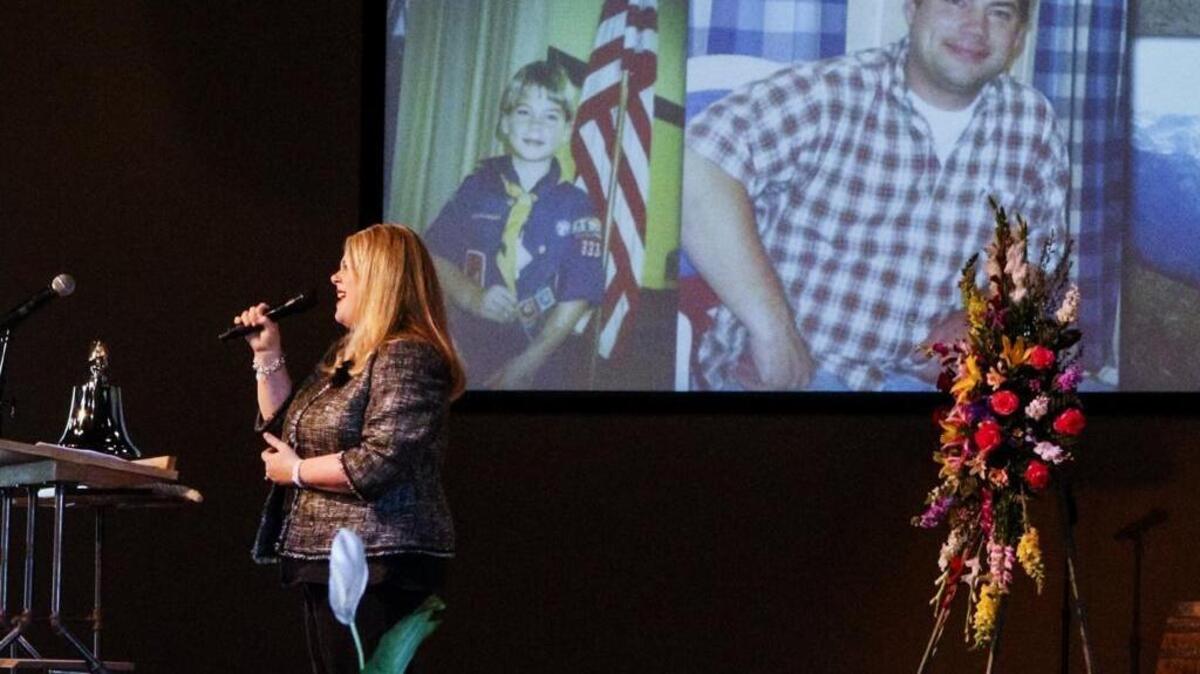 Tiffany Edgerle, cousin of Matthew Frank sings “I Can Only Imagine” as a slideshow with images of Frank is shown during his memorial at Mountainbrook Church in San Luis Obispo.