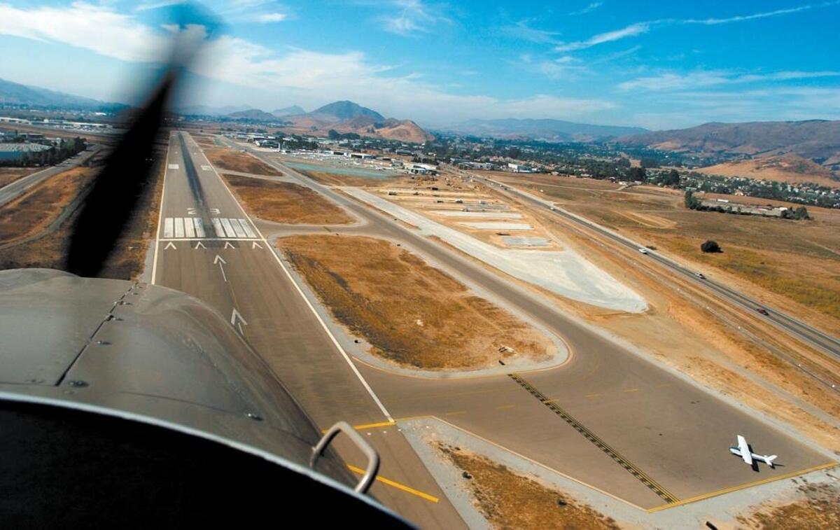 2006: Gary Sparks pilots a Cessna Turbo 182 over the San Luis Obispo County Regional Airport on Sept. 28, 2006.