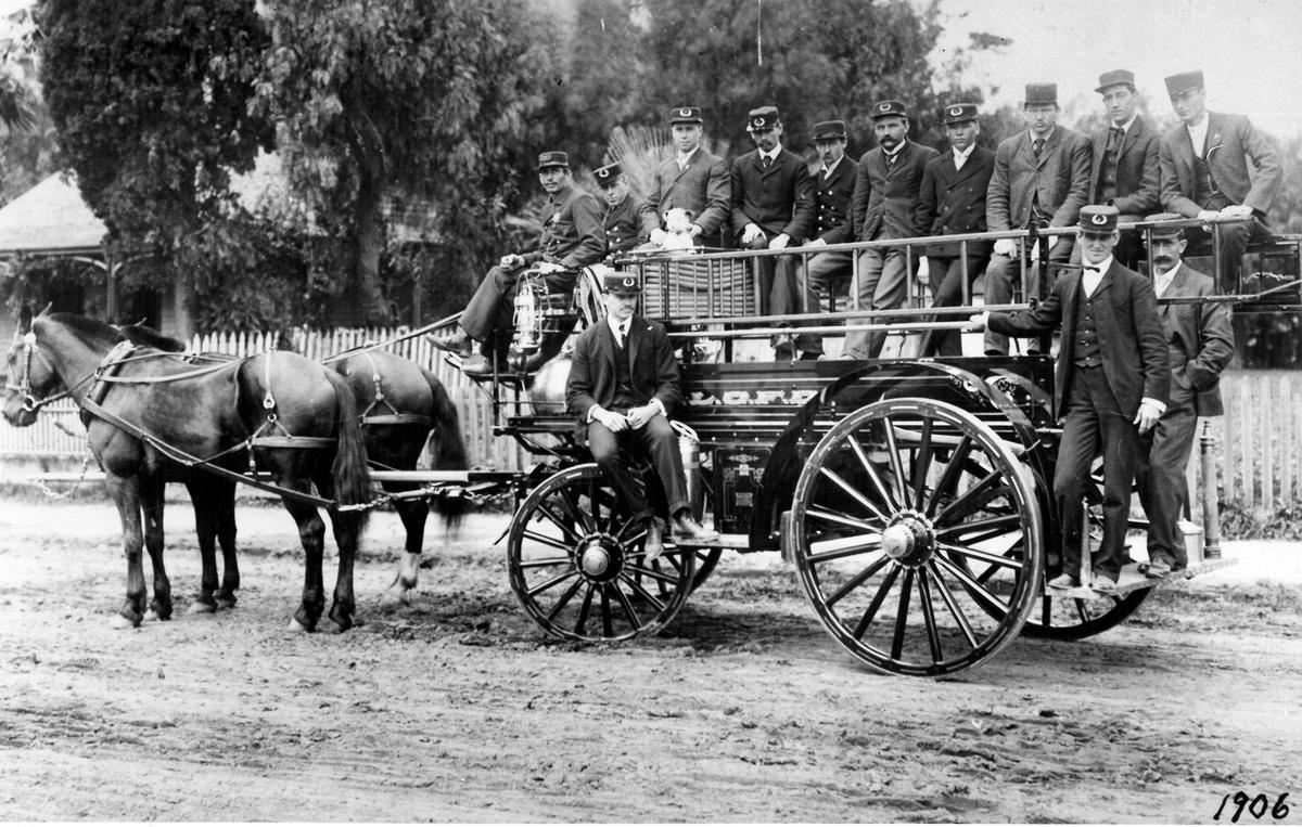 San Luis Obispo Fire Department volunteers pose for a picture in 1906 with their horse-drawn chemical wagon, now located in the lobby of Station 1. Gasoline engines were about to retire the horses. Top row from left: Charles Hasse, John Isola, Manuel Lopez, Billie Bambrouck, John Kirkeby, Johnnie Martin, Mr. Parsons, Henry Berkemeyer, Frank Tercis and Warren M. John. Lower row, Frank Soto, Ernest Taylor and Joe Ghigliotti. Their dog sits on the hoses, and their the uniforms seem better suited for parades than the gritty work of firefighting.