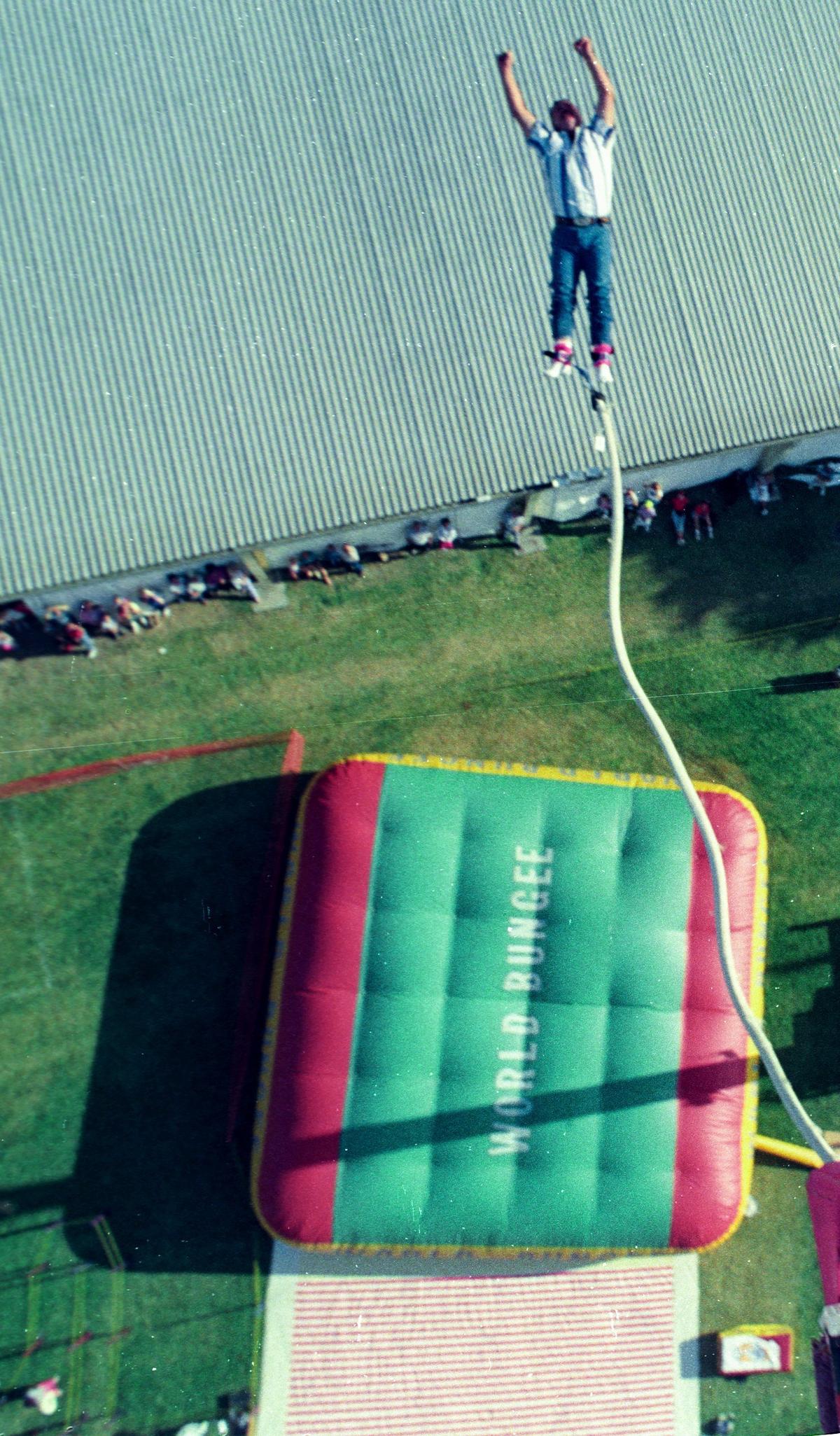 Heeding bungee instructor Gary Hinton’s advice to “Don’t think, just jump,” Skip Kale of Bakersfield takes a flying leap downward from the World Bungee tower at the California Mid-State Fair in Paso Robles in August 1992.