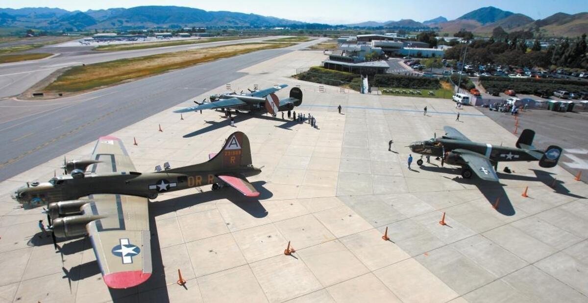 2007: World War II-era bombers parked at the San Luis Obispo County airport. From left: B-17 flying fortress, B-24 Liberator and B-25 Mitchell.