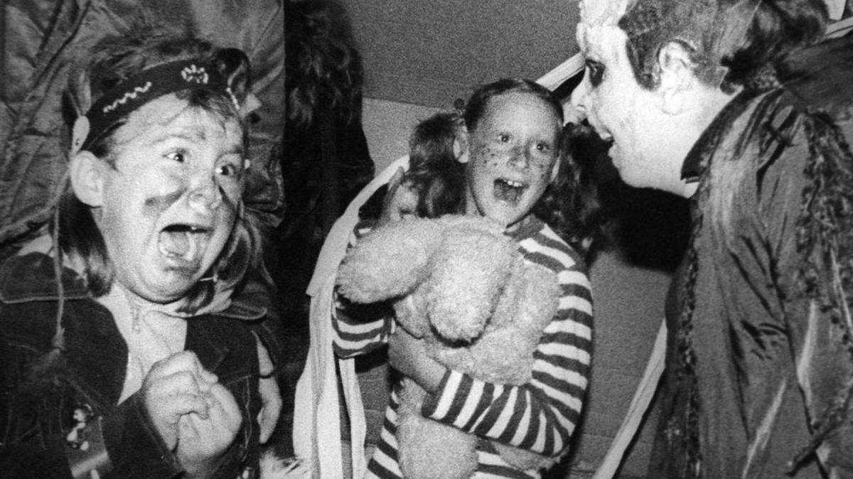 On Halloween night 1979, Raven Schlossberg clutches her hands and screams at a costumed Bruce Smith at Theta Chi haunted house in San Luis Obispo. Her friend, Tawny Claussen, also let out a shriek.