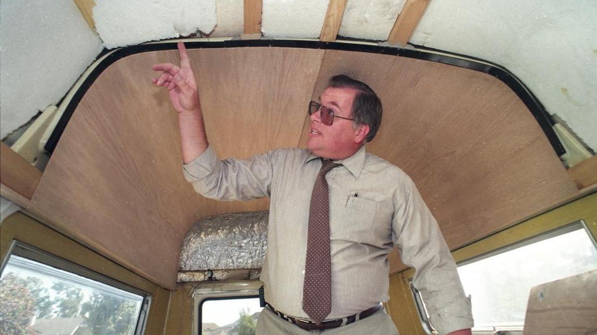 Emerson Hunt points to area where he and his father-in-law discovered 33 pounds of hashish in 1995 while they were restoring a 19-year-old Mercedes van.