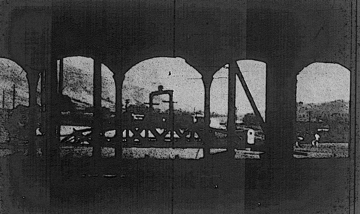 The turntable at the Southern Pacific roundhouse, a merry-go-round of sorts which shuttled steam locomotives into the building, is framed in the photo above taken from inside the roundhouse.