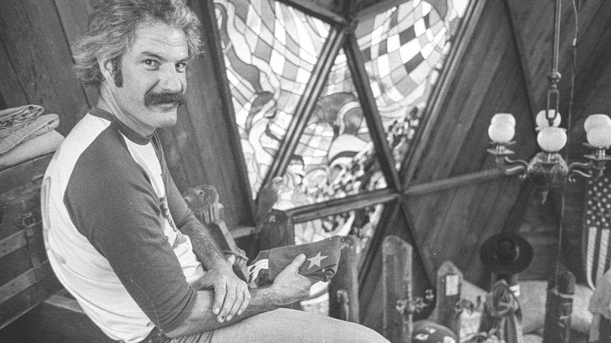 Freeman Freitag at his house. The redwood egg-shaped hemiellipsoid was a landmark built in the 1970s.