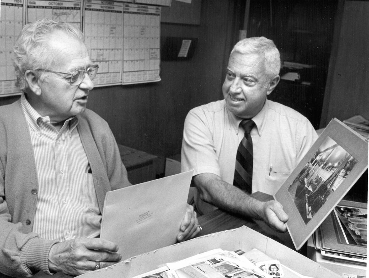 George Christensen, left, and Ross Humphrey get a laugh out of some Rileys memorabilia. The department store chain was sold to Charles Ford & Co. of Watsonville a few months later. David Middlecamp 5-28-1987