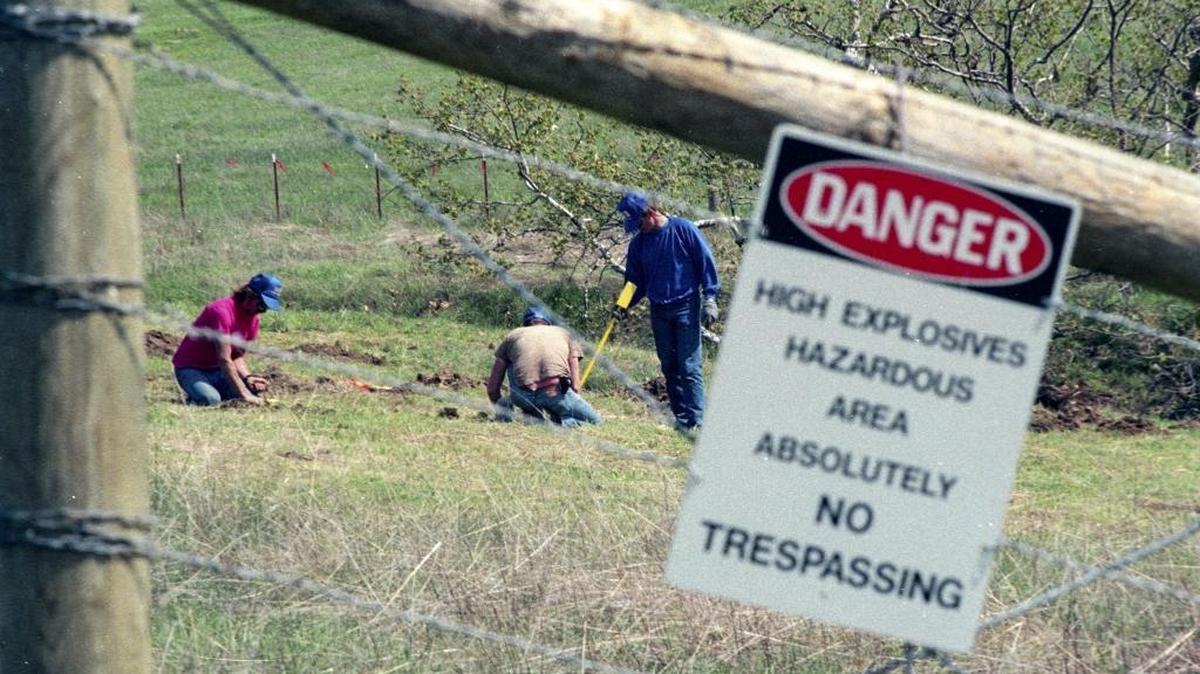 An eight-man crew from UXB International works to clear World War II-era explosives from Rancho El Chorro in San Luis Obispo to make way for the San Luis Obispo Botanical Garden. This area was a Camp San Luis Obispo grenade pit during World War II.
